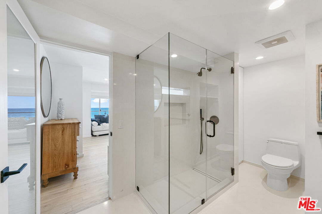 24928 Malibu Road Malibu, CA 90265 - Photo 42 of 50 a bathroom with a shower and a toilet