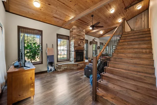 a kitchen with stainless steel appliances a refrigerator sink and cabinets