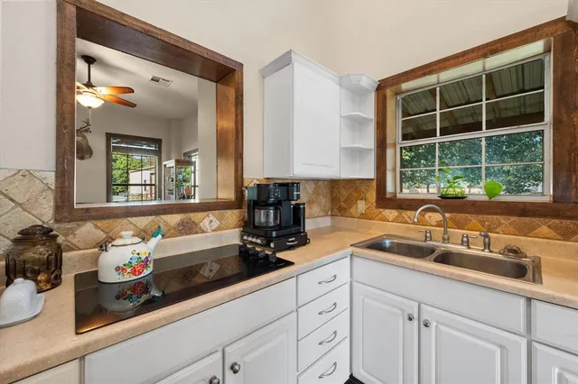 a view of kitchen and washer and dryer