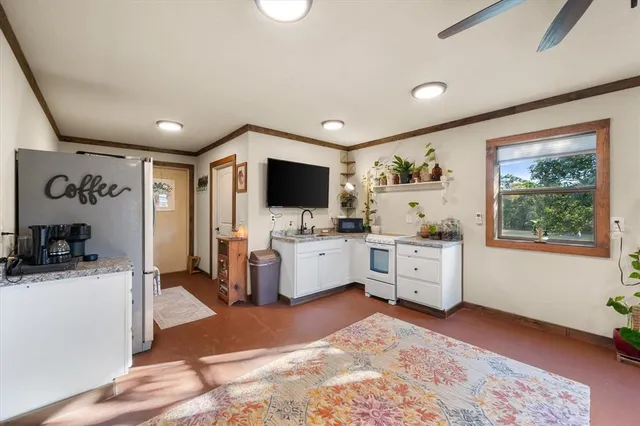 a house view with a garden space