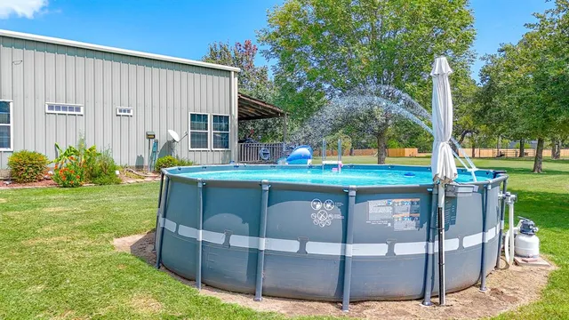 a view of a trees in front of a house