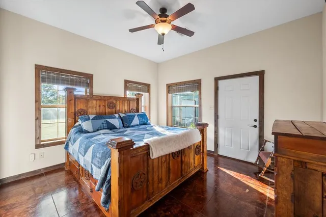 a view of an house with backyard and porch