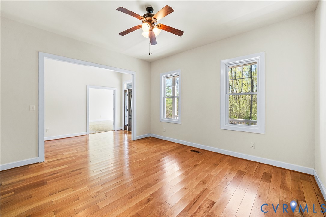 15430 River Road Chesterfield, VA 23838 - Photo 17 of 46 a view of an empty room with window and wooden floor