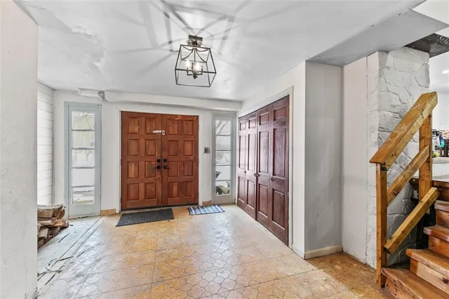 a view of a livingroom with a staircase