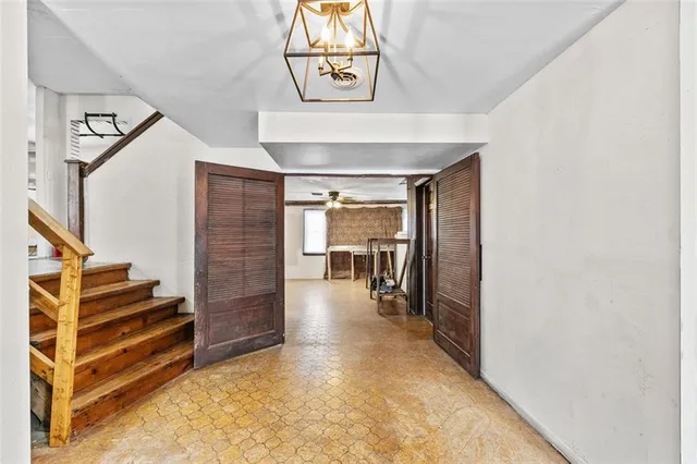 a living room with a couch and a window