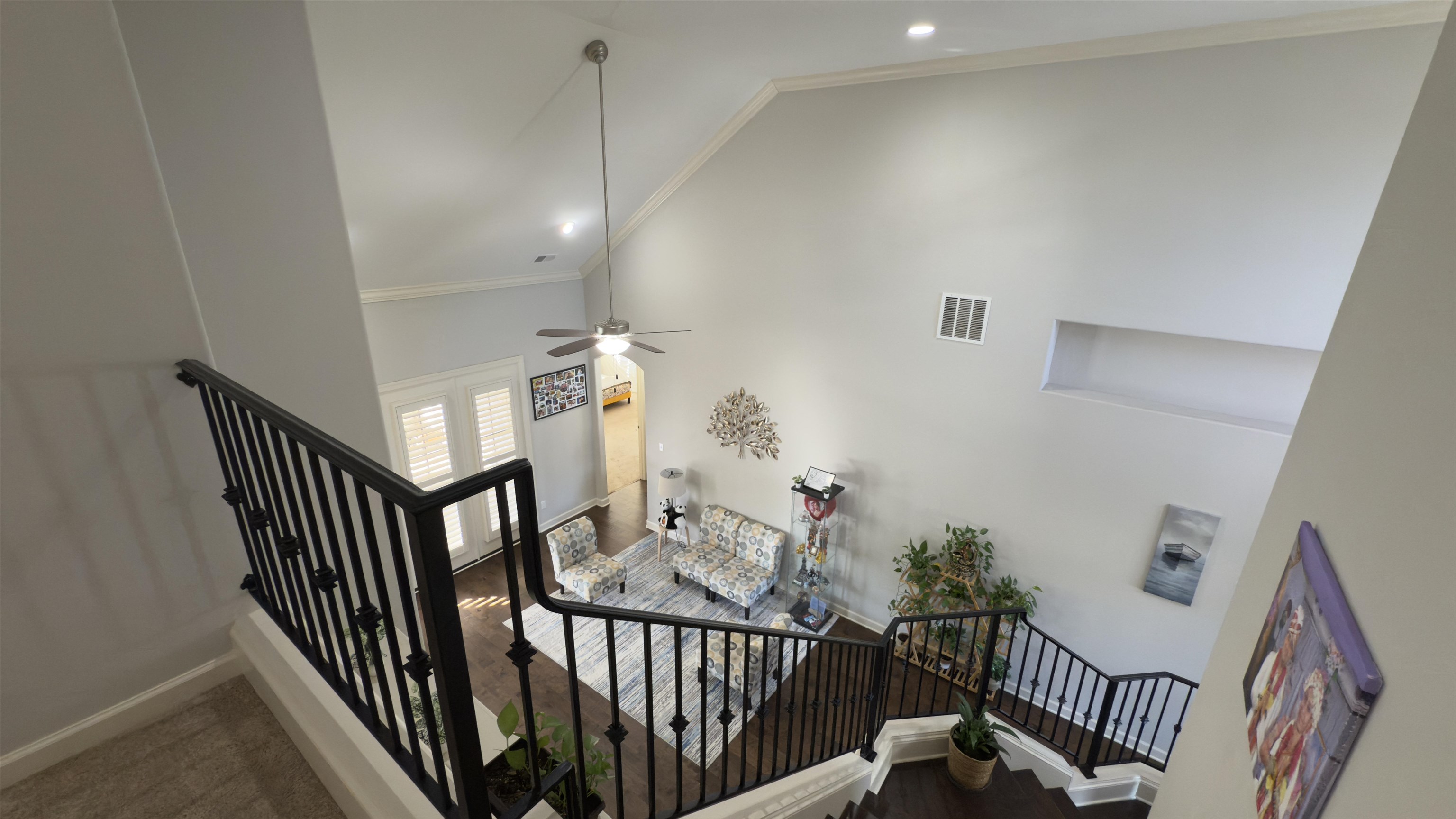 1217 Pilgrim Ridge Road Collierville, TN 38017 - Photo 23 of 33 Staircase with high vaulted ceiling, ornamental molding, a ceiling fan, and carpet floors