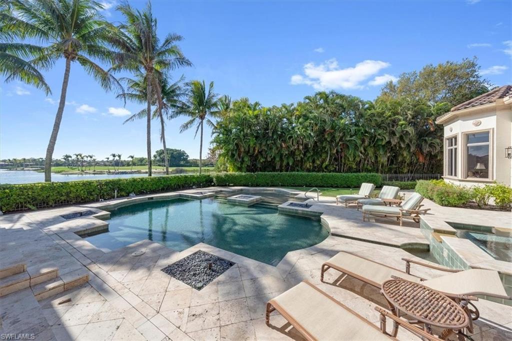 2116 Canna Way Naples, FL 34105 - Photo 49 of 50 a view of a patio with swimming pool