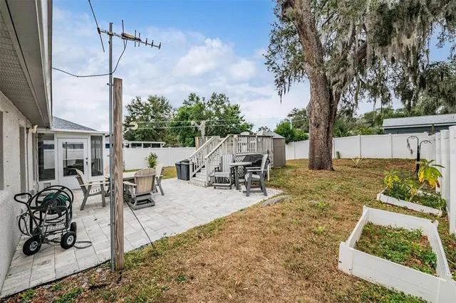 a view of outdoor space yard deck patio and swimming pool