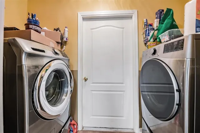 a utility room with dryer and washer