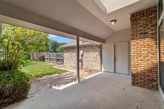 a view of a backyard with a garden