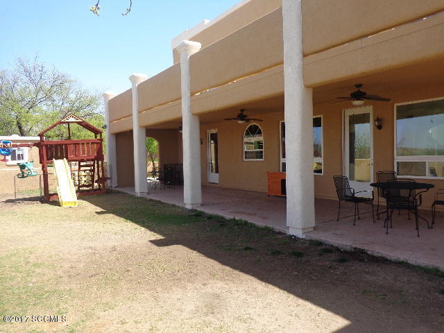 274 Camino Panama Rio Rico, AZ 85648 - Photo 11 of 23 a view of a building with a patio