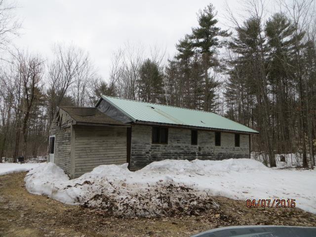 290 Stone Hill Road Limerick, ME 04048 - Photo 1 of 7 Front exterior of home. The attached...