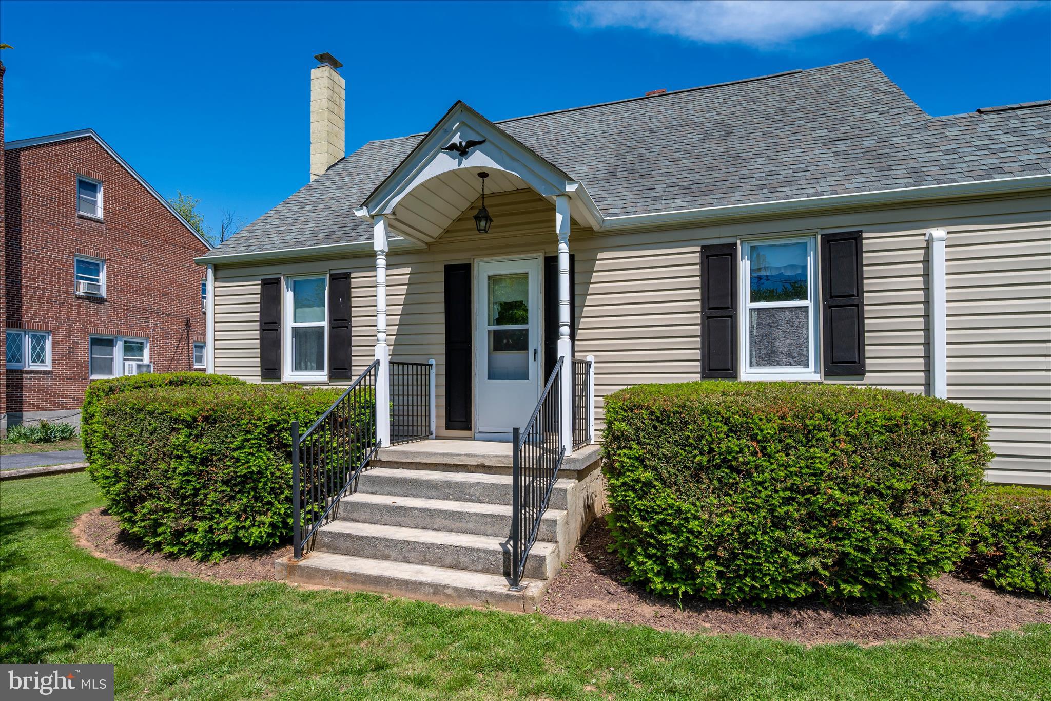 11205 Hessong Bridge Road Thurmont, MD 21788 - Photo 2 of 69 a front view of a house with a yard