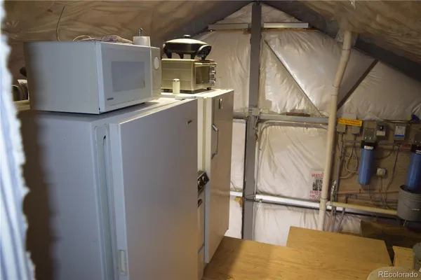 a view of storage and utility room