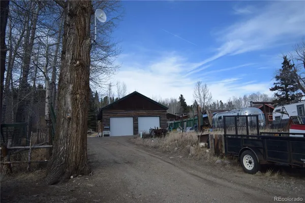 a view of outdoor space and backyard