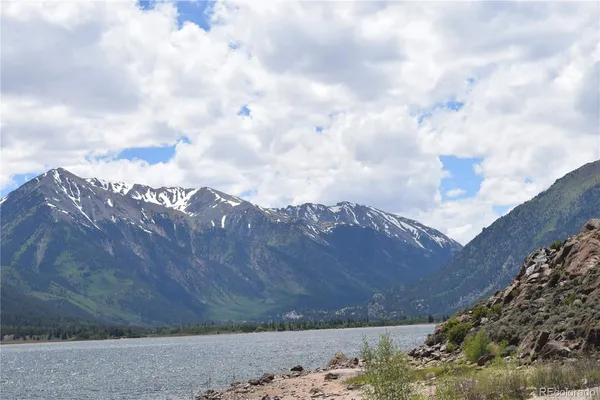 a view of mountain with mountains in the background