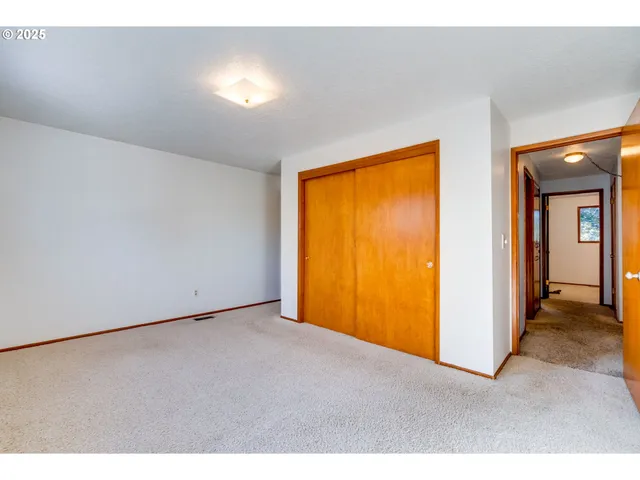 a bathroom with a sink a mirror and a shower