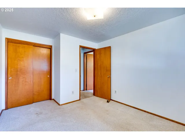 a view of an empty room with window