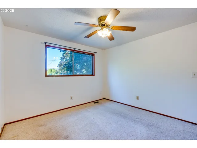 a bathroom with a bathtub a toilet and a shower
