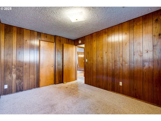 a view of hallway with washer and dryer