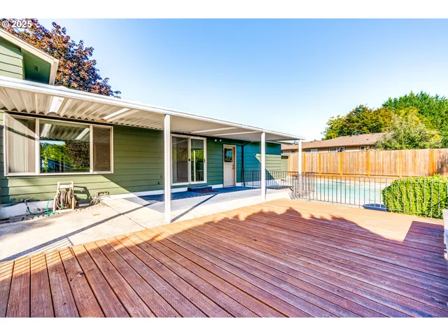 a view of a livingroom with furniture and a fireplace