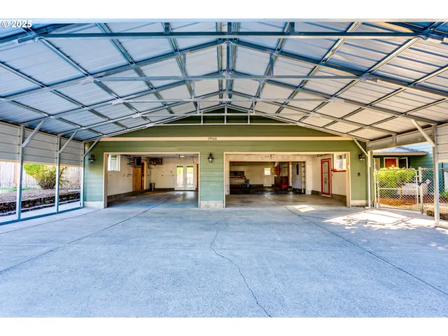 a backyard of a house with lots of green space
