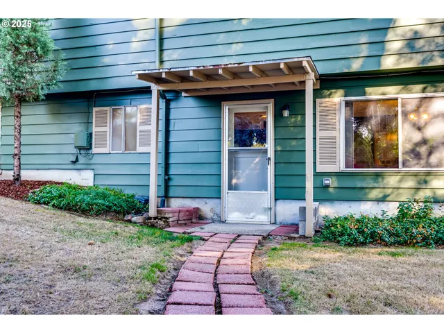 a view of a house with entertaining space