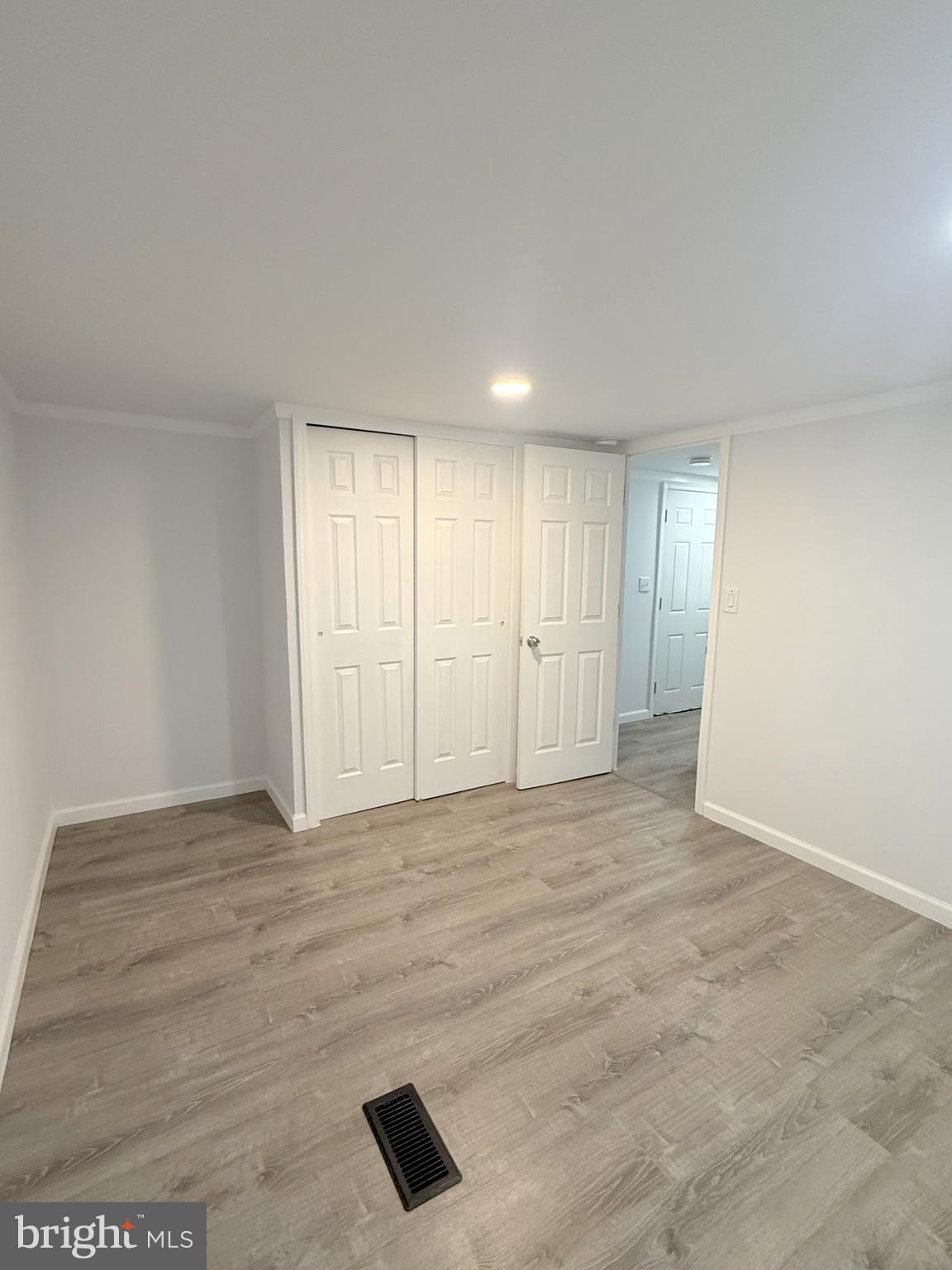 3638 Weymouth Road Browns Mills, NJ 08015 - Photo 7 of 14 a view of an empty room with a window