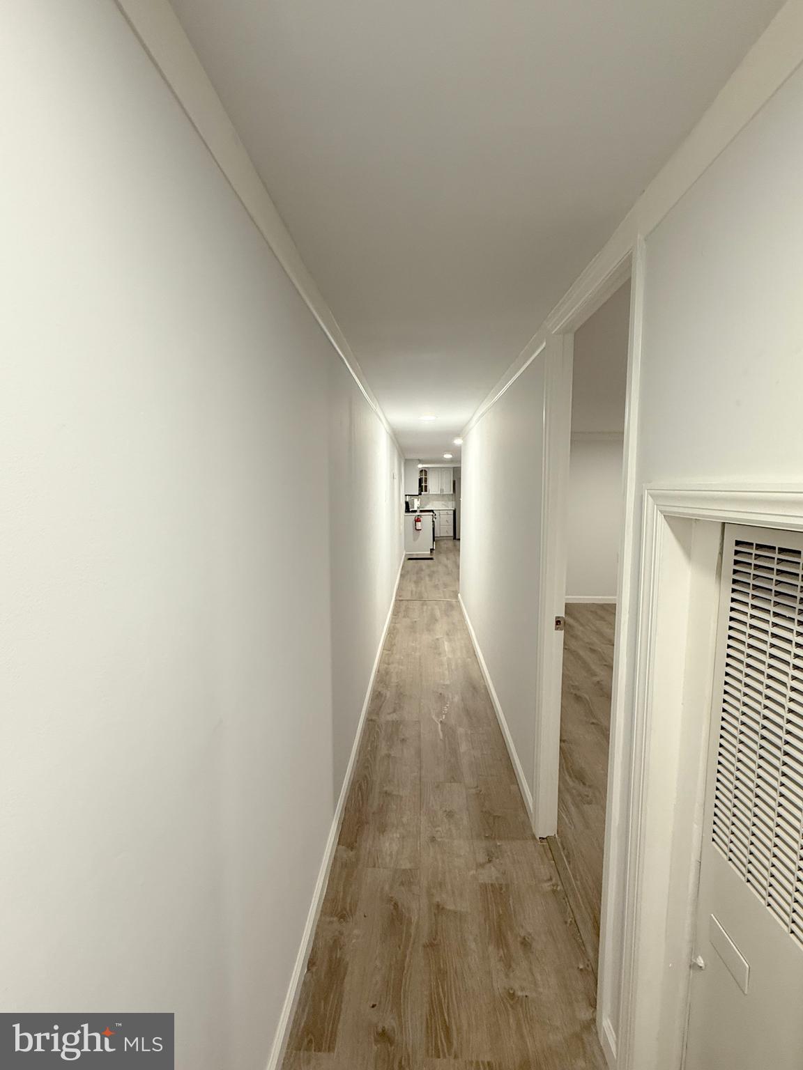 3638 Weymouth Road Browns Mills, NJ 08015 - Photo 9 of 14 a view of a hallway with wooden floor