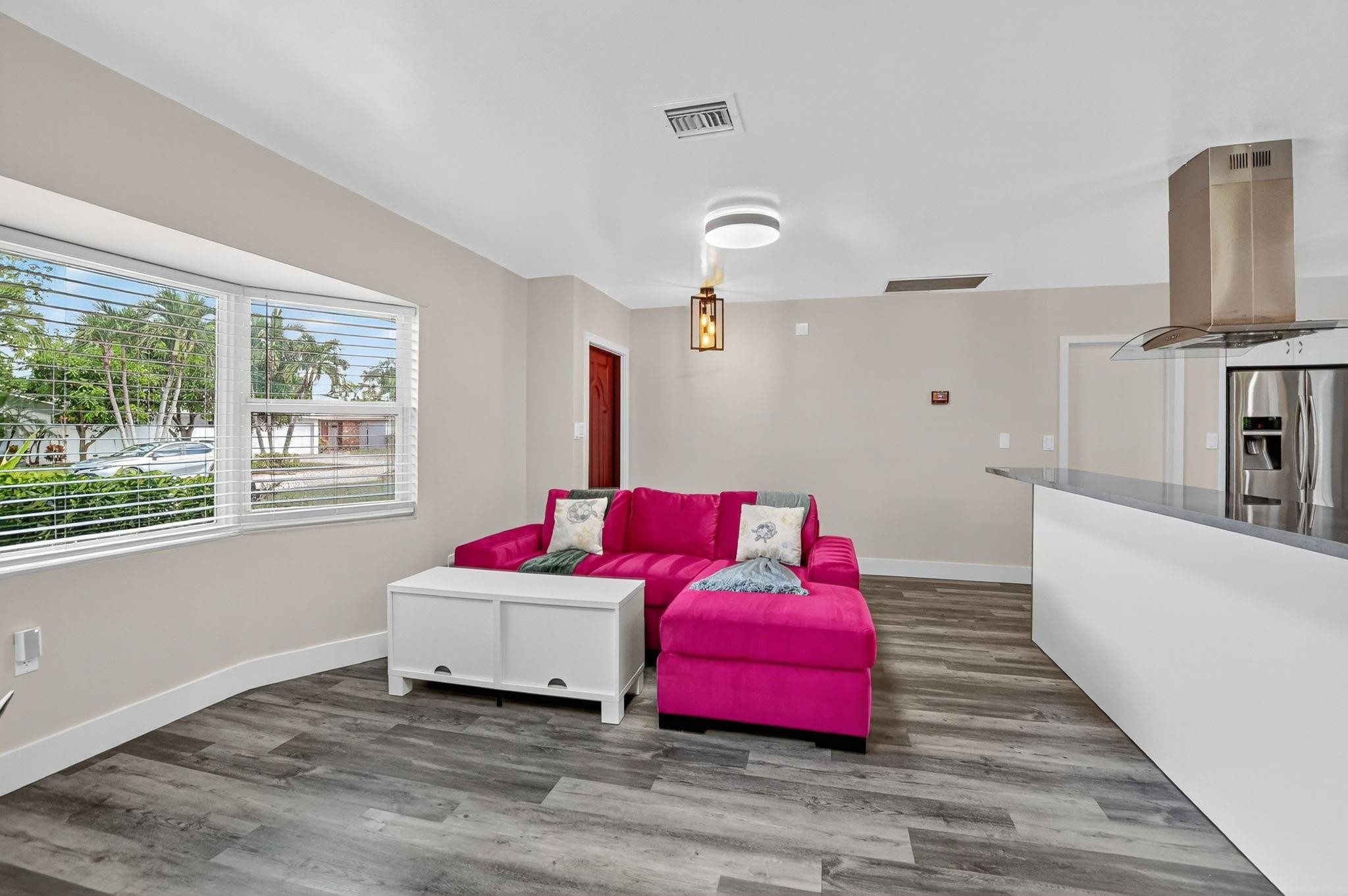 1650 Northwest 9th Street Boca Raton, FL 33486 - Photo 11 of 57 a living room with furniture fireplace and flat screen tv