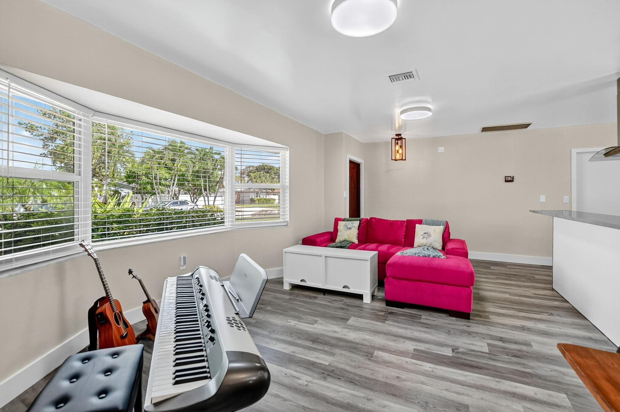 1650 Northwest 9th Street Boca Raton, FL 33486 - Photo 16 of 57 a living room with furniture and a large window