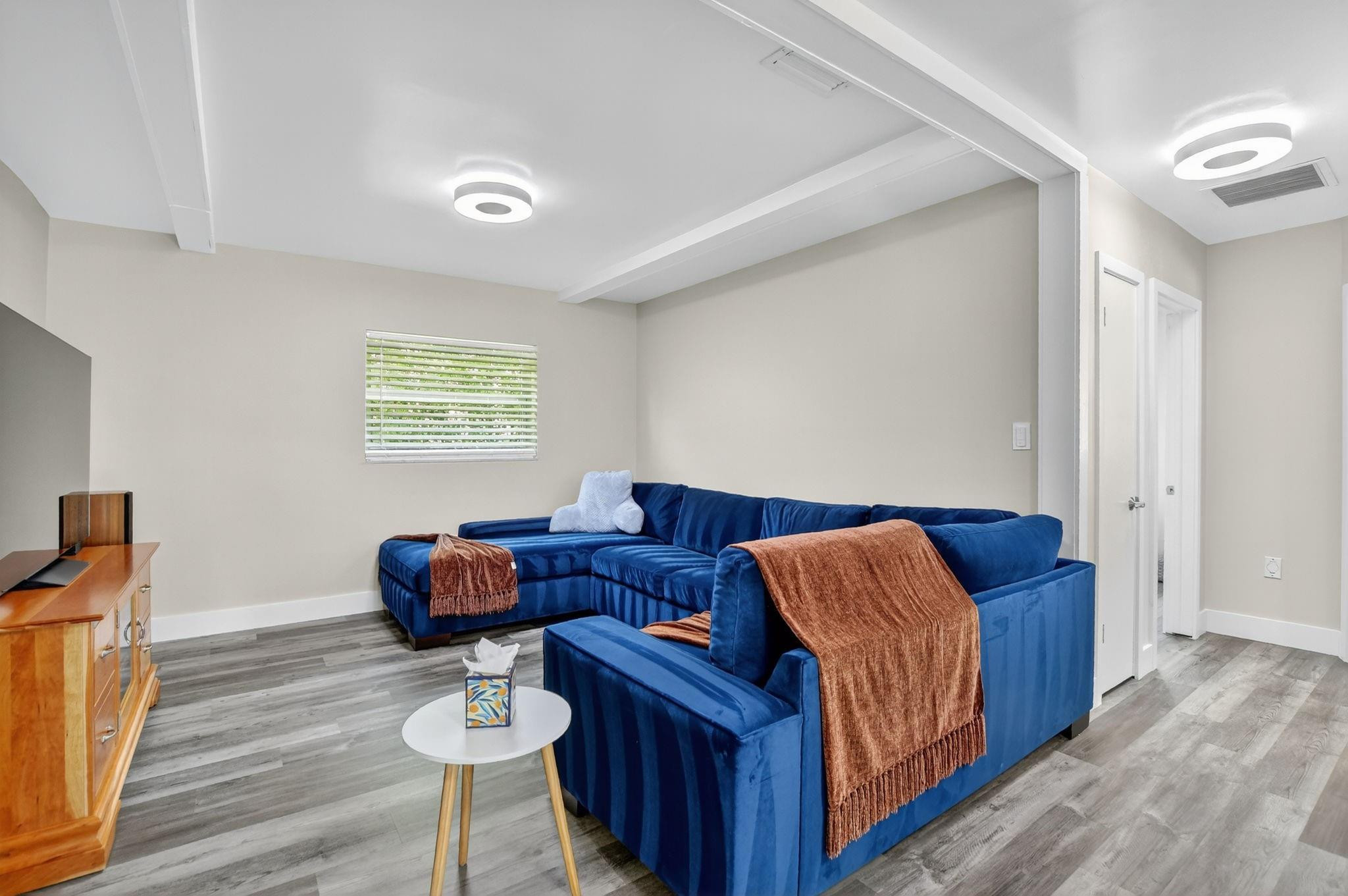 1650 Northwest 9th Street Boca Raton, FL 33486 - Photo 20 of 57 a living room with furniture and a wooden floor