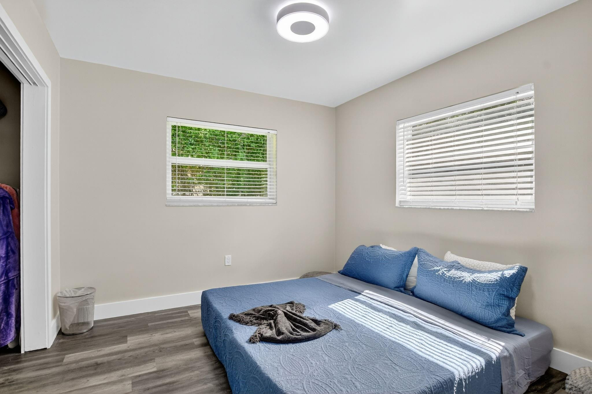 1650 Northwest 9th Street Boca Raton, FL 33486 - Photo 29 of 57 a bed room with a bed and a window