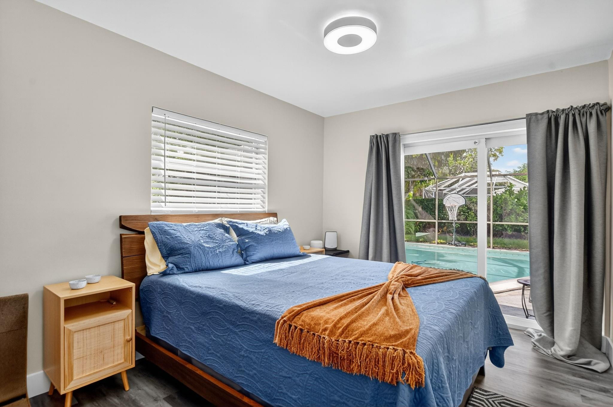 1650 Northwest 9th Street Boca Raton, FL 33486 - Photo 32 of 57 a bedroom with bed and balcony