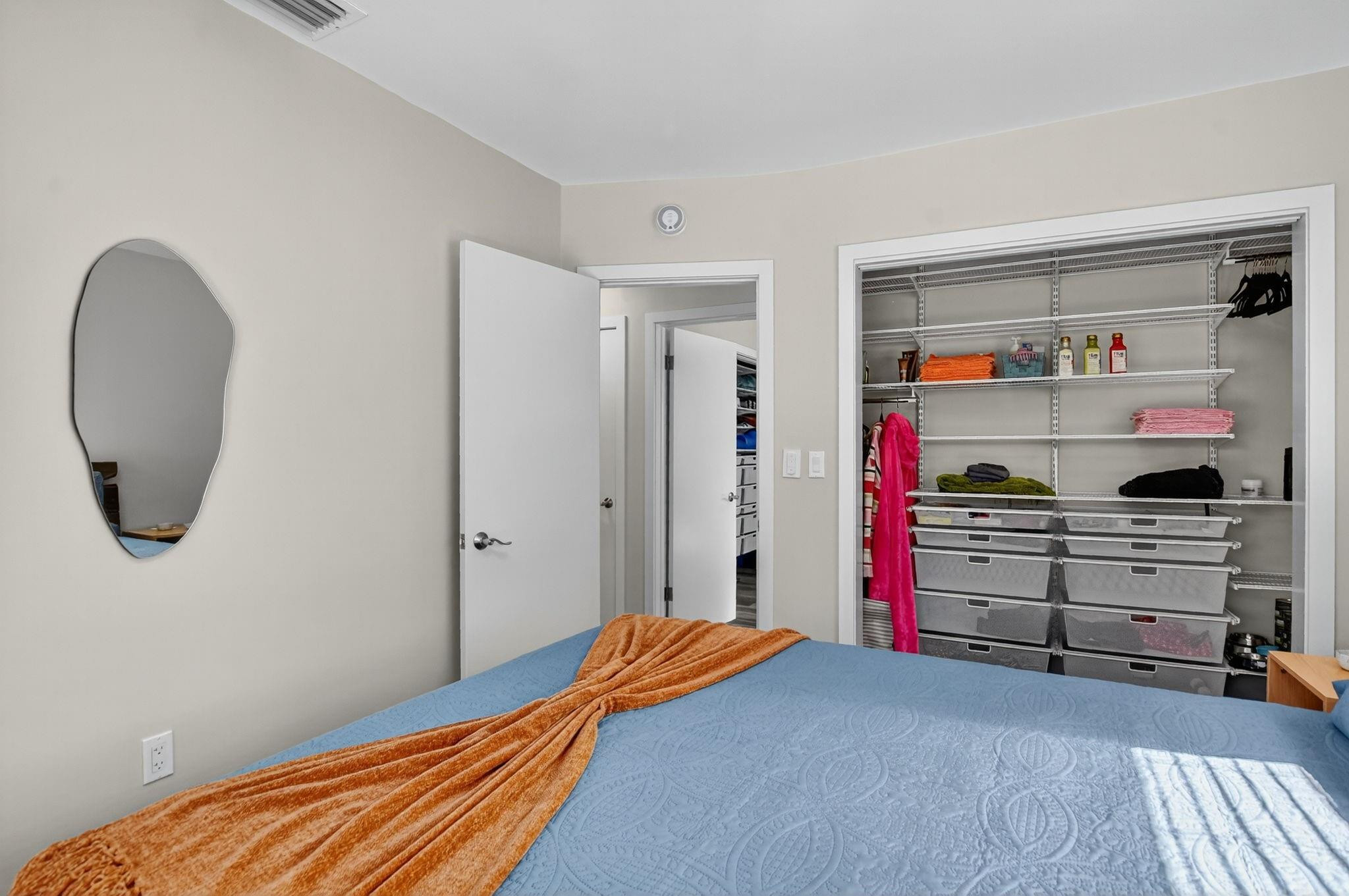 1650 Northwest 9th Street Boca Raton, FL 33486 - Photo 33 of 57 a bedroom with a bed and a closet