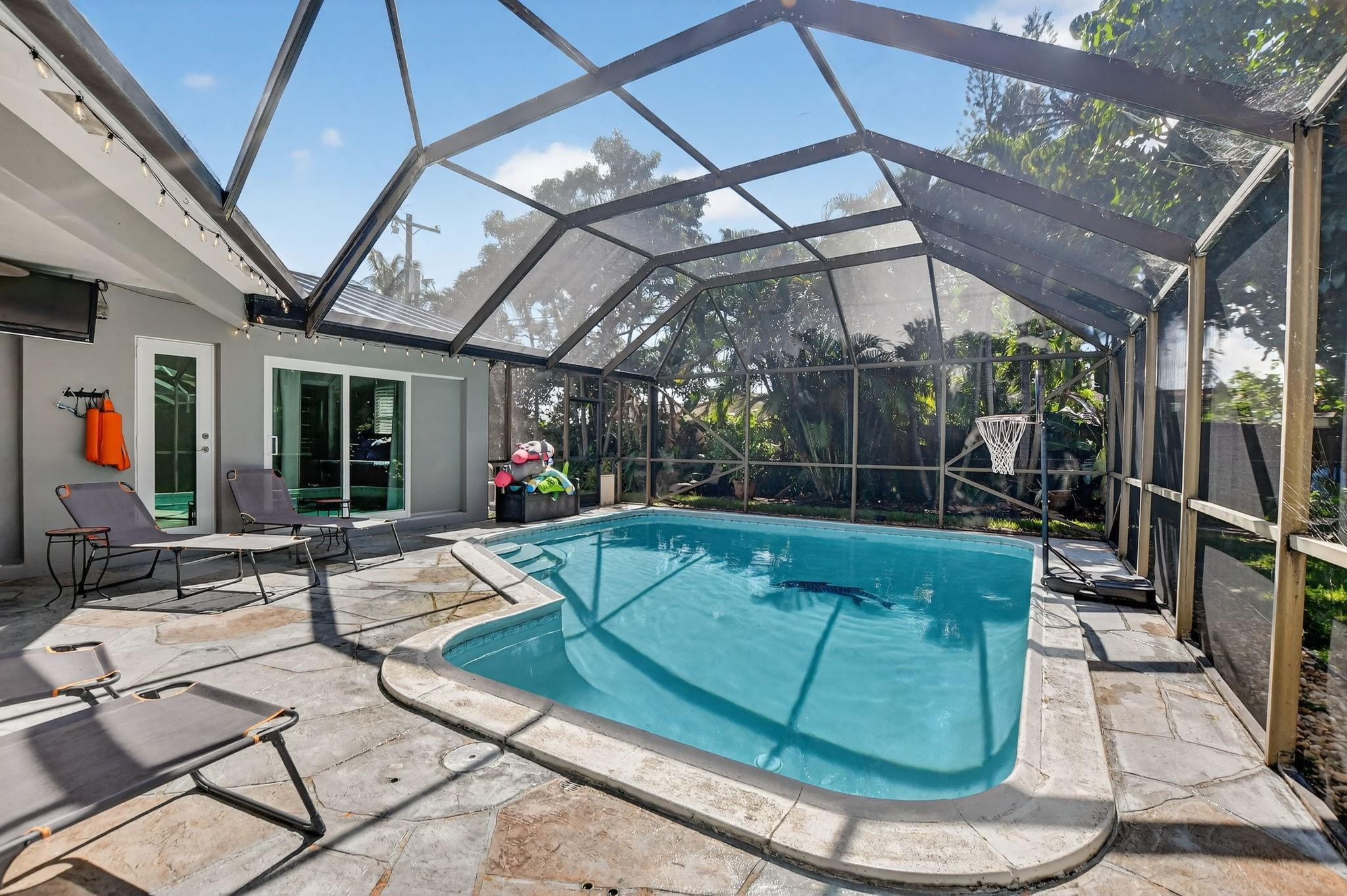 1650 Northwest 9th Street Boca Raton, FL 33486 - Photo 37 of 57 a view of swimming pool with outdoor seating