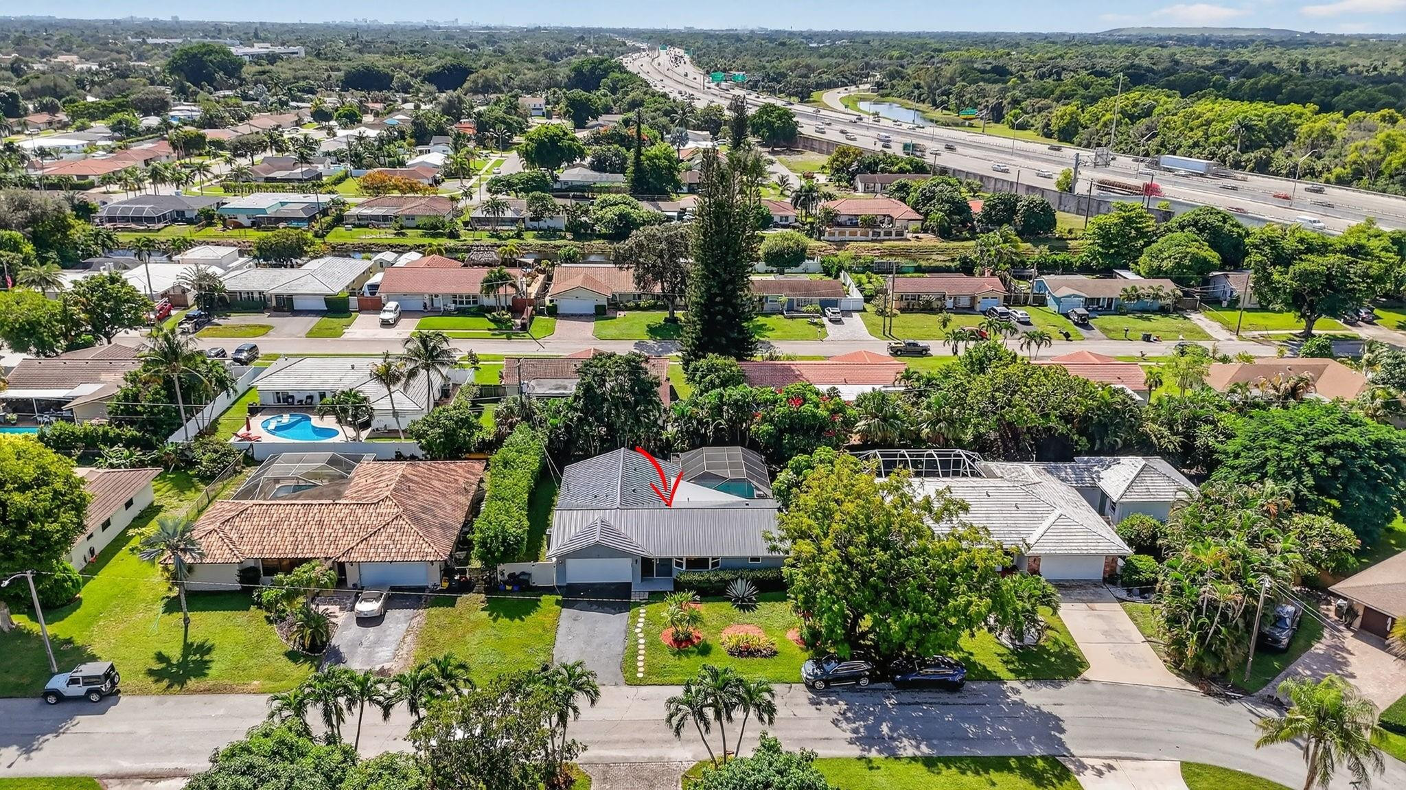 1650 Northwest 9th Street Boca Raton, FL 33486 - Photo 49 of 57 an aerial view of residential houses with outdoor space