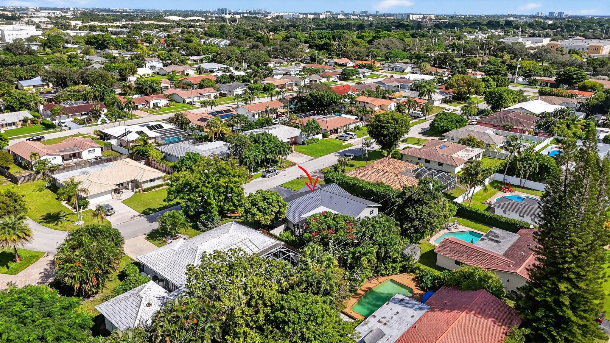1650 Northwest 9th Street Boca Raton, FL 33486 - Photo 53 of 57 an aerial view of residential houses with outdoor space and trees
