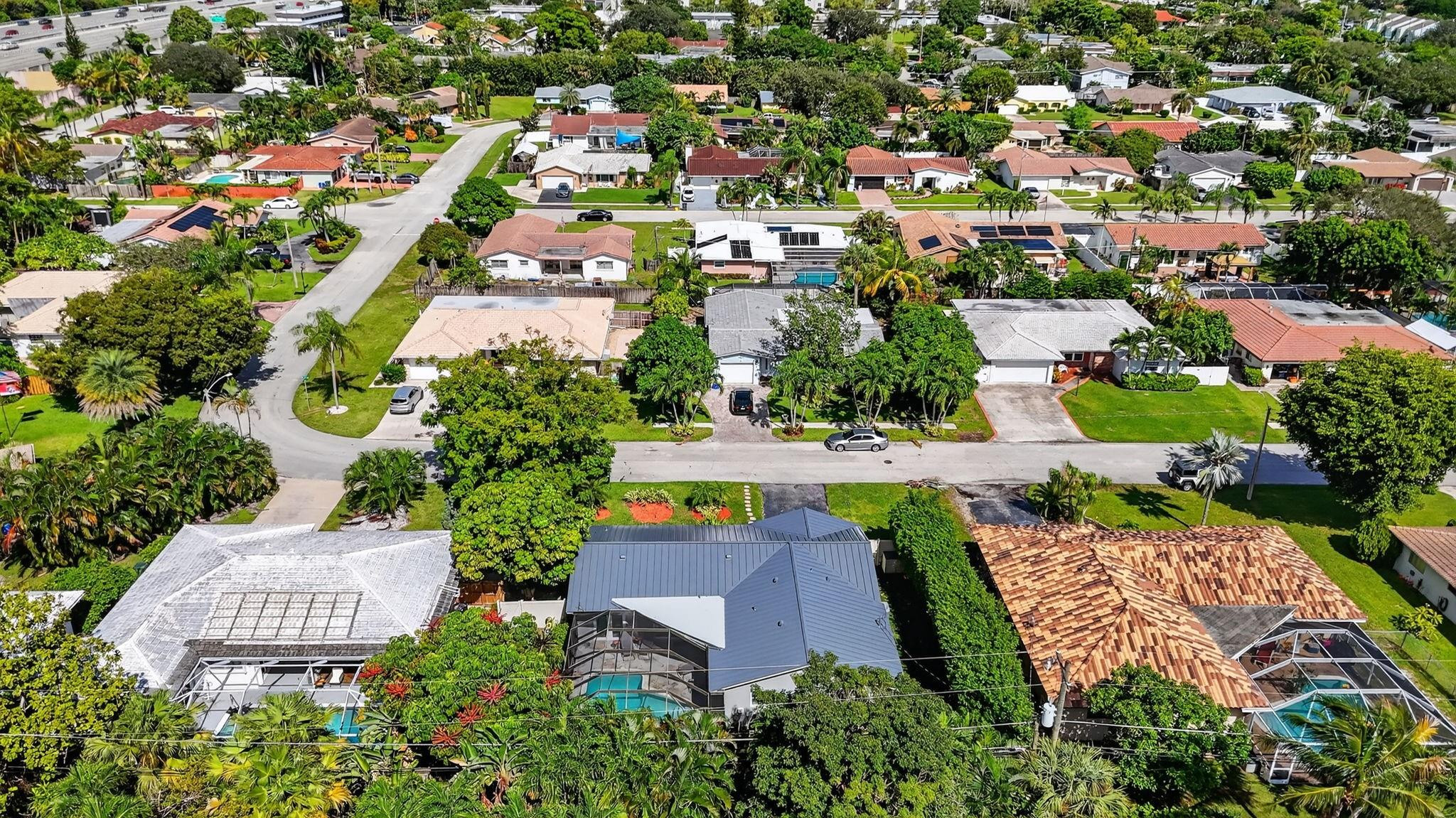 1650 Northwest 9th Street Boca Raton, FL 33486 - Photo 55 of 57 an aerial view of multiple houses with yard