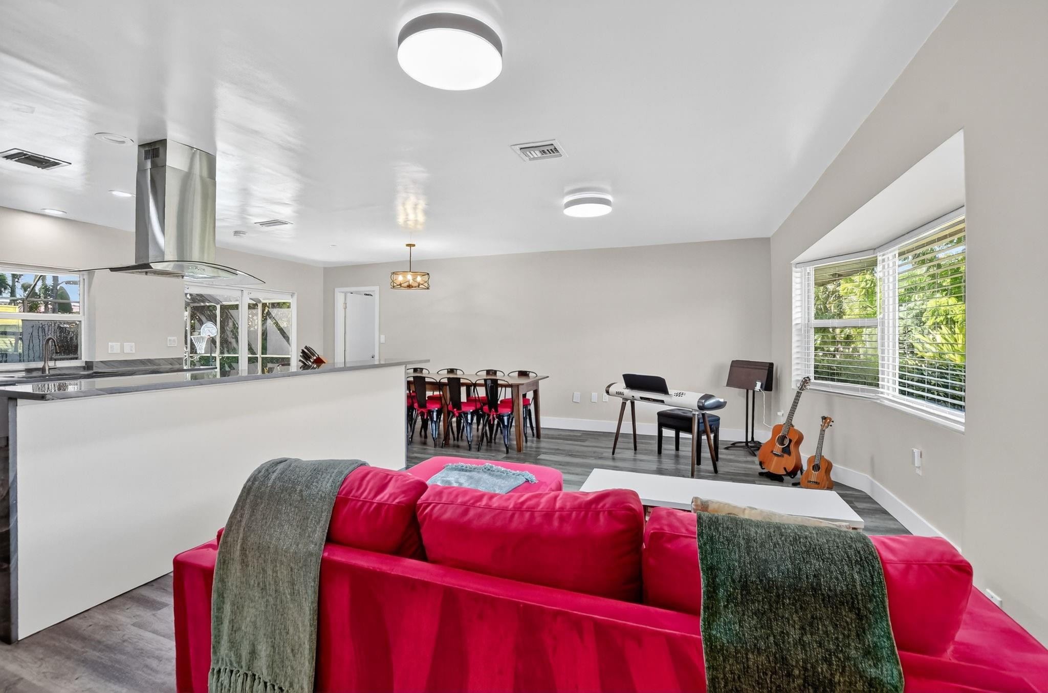 1650 Northwest 9th Street Boca Raton, FL 33486 - Photo 10 of 57 a living room with furniture and a flat screen tv