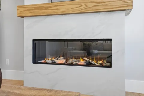 a bedroom with a bed and a table