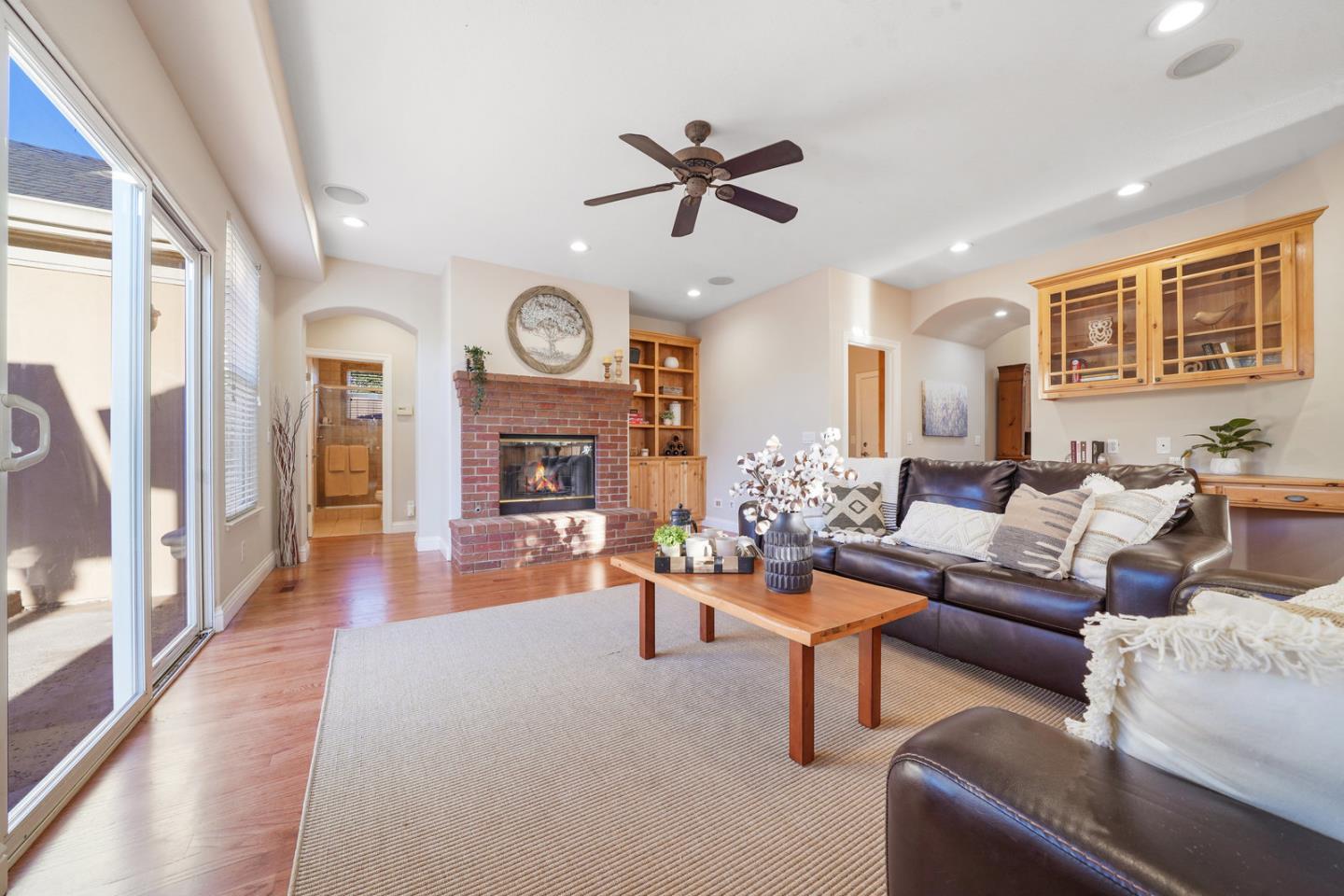 761 Dakota Drive Morgan Hill, CA 95037 - Photo 11 of 32 a living room with fireplace furniture and a large window
