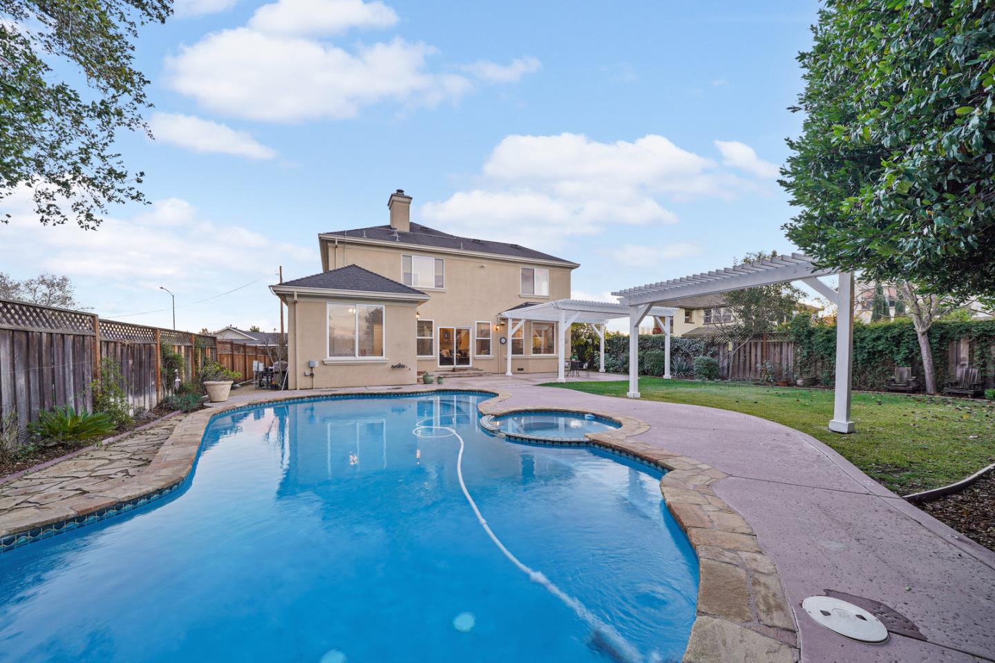 761 Dakota Drive Morgan Hill, CA 95037 - Photo 30 of 32 a view of a house with swimming pool and a yard