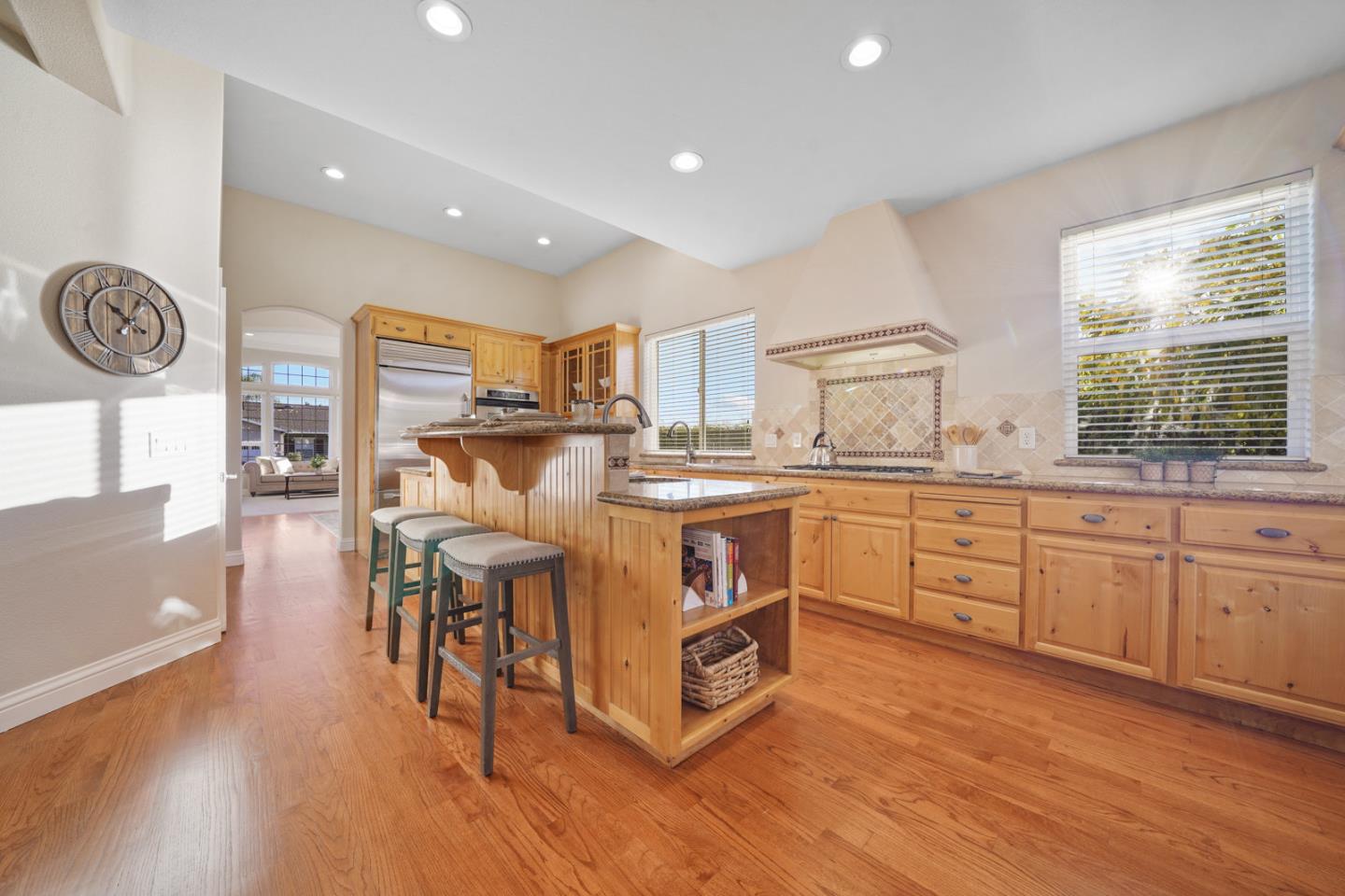 761 Dakota Drive Morgan Hill, CA 95037 - Photo 7 of 32 a kitchen with a sink cabinets and wooden floor