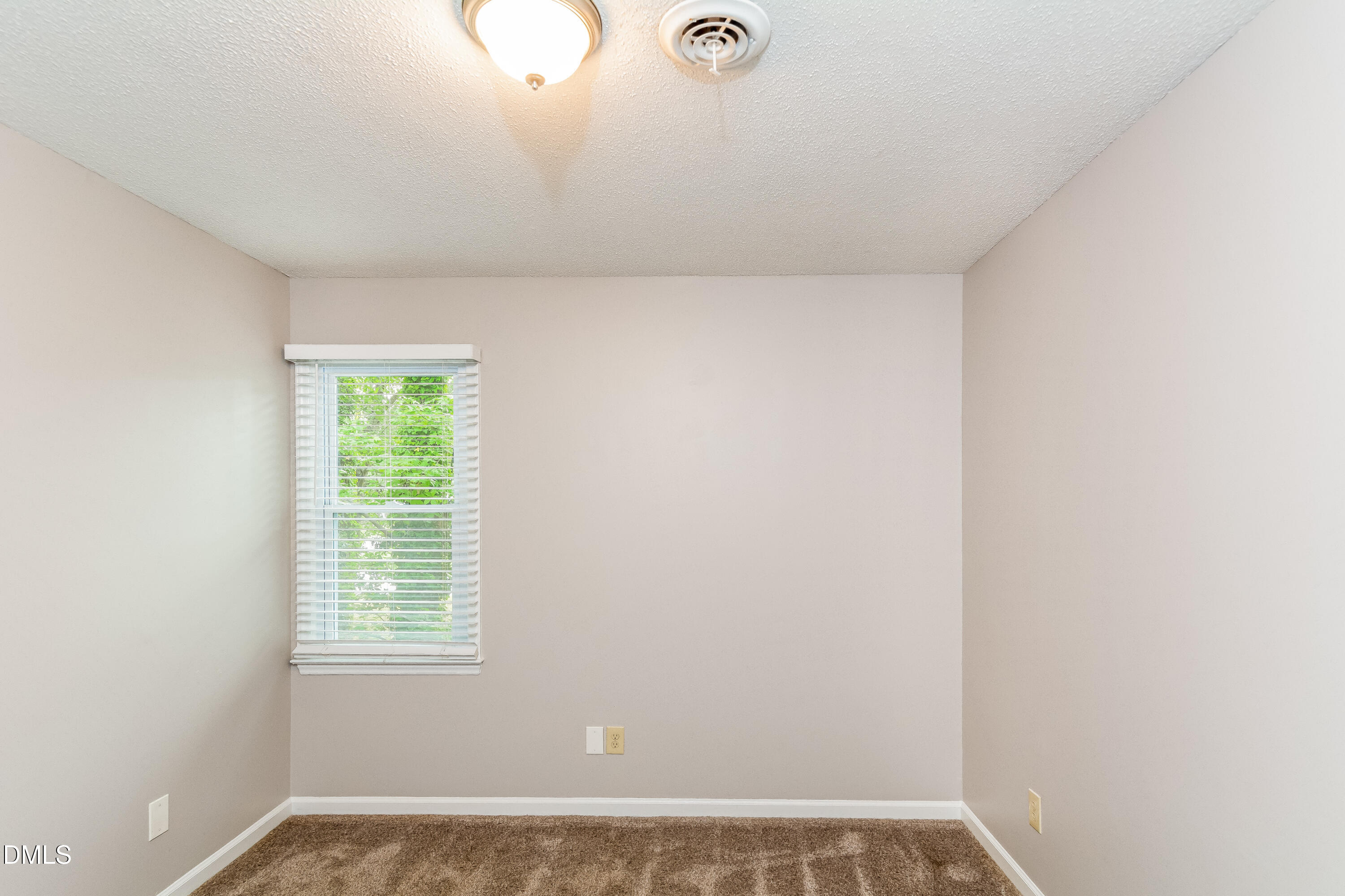 405 Hunters Ridge Drive Fuquay-Varina, NC 27526 - Photo 9 of 17 a view of a room with window