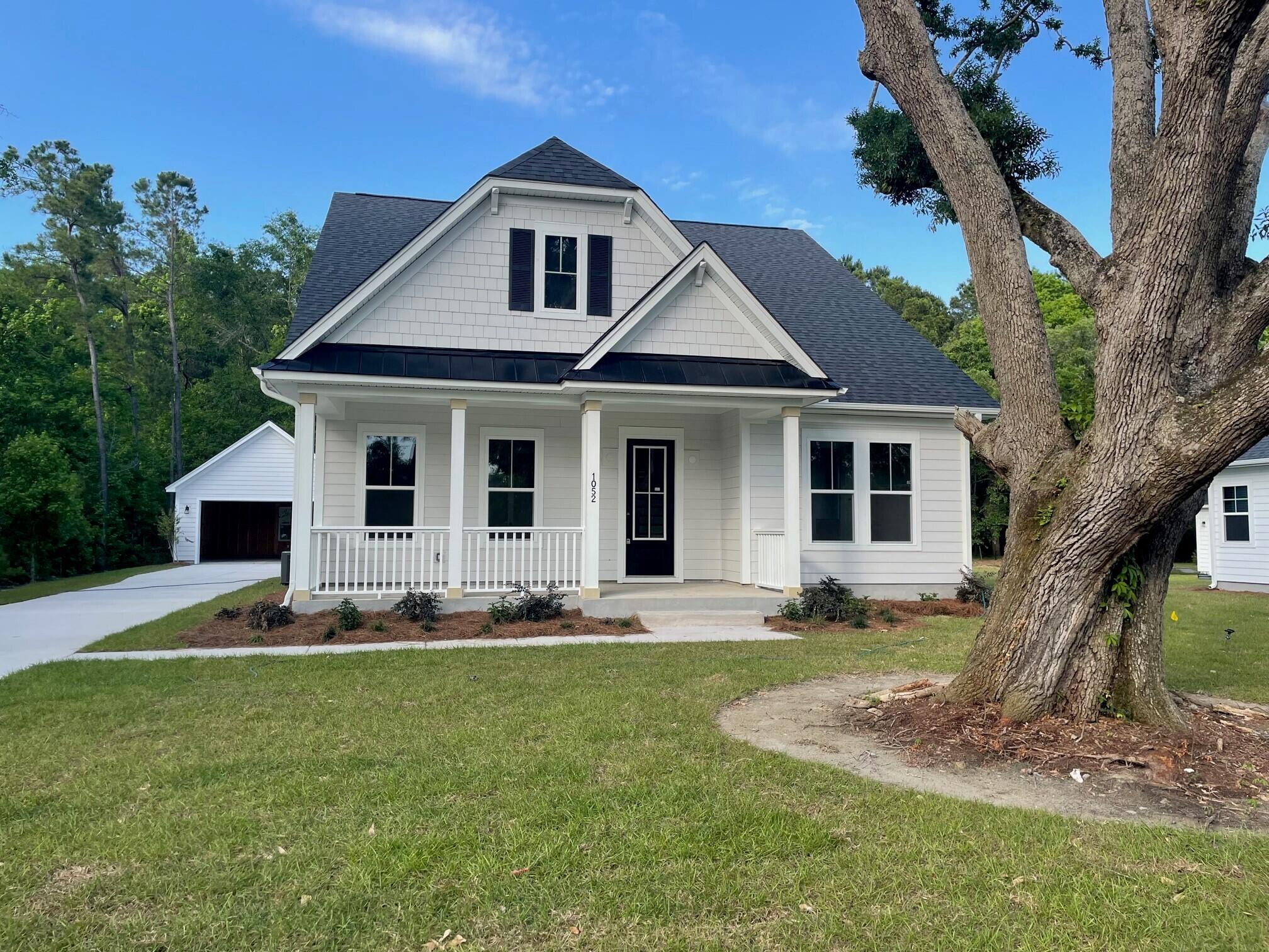 1052 Theodore Road Awendaw, SC 29429 - Photo 1 of 23 1050 Theodore Road