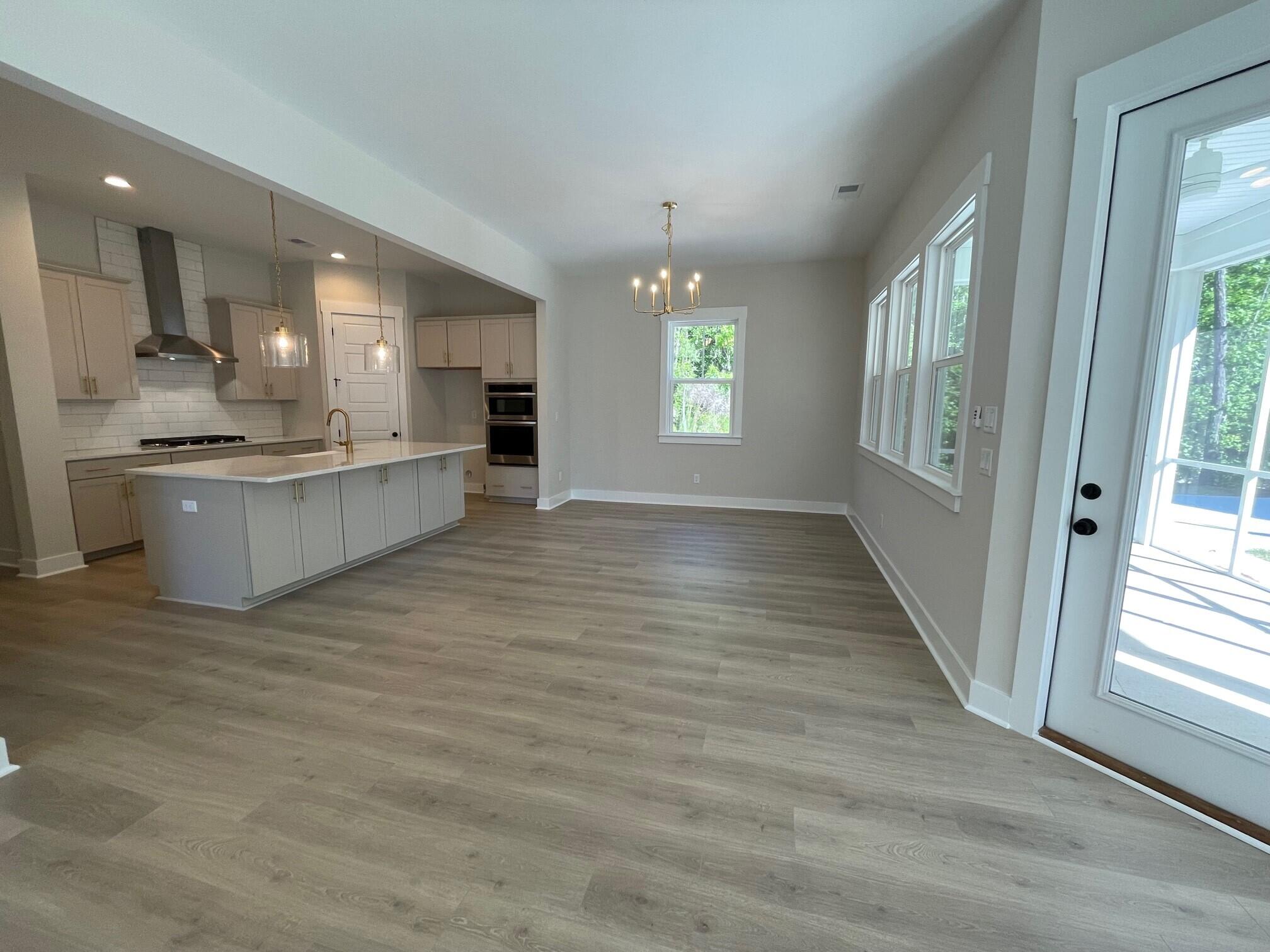 1052 Theodore Road Awendaw, SC 29429 - Photo 4 of 23 Kitchen and Living Room Combo 2