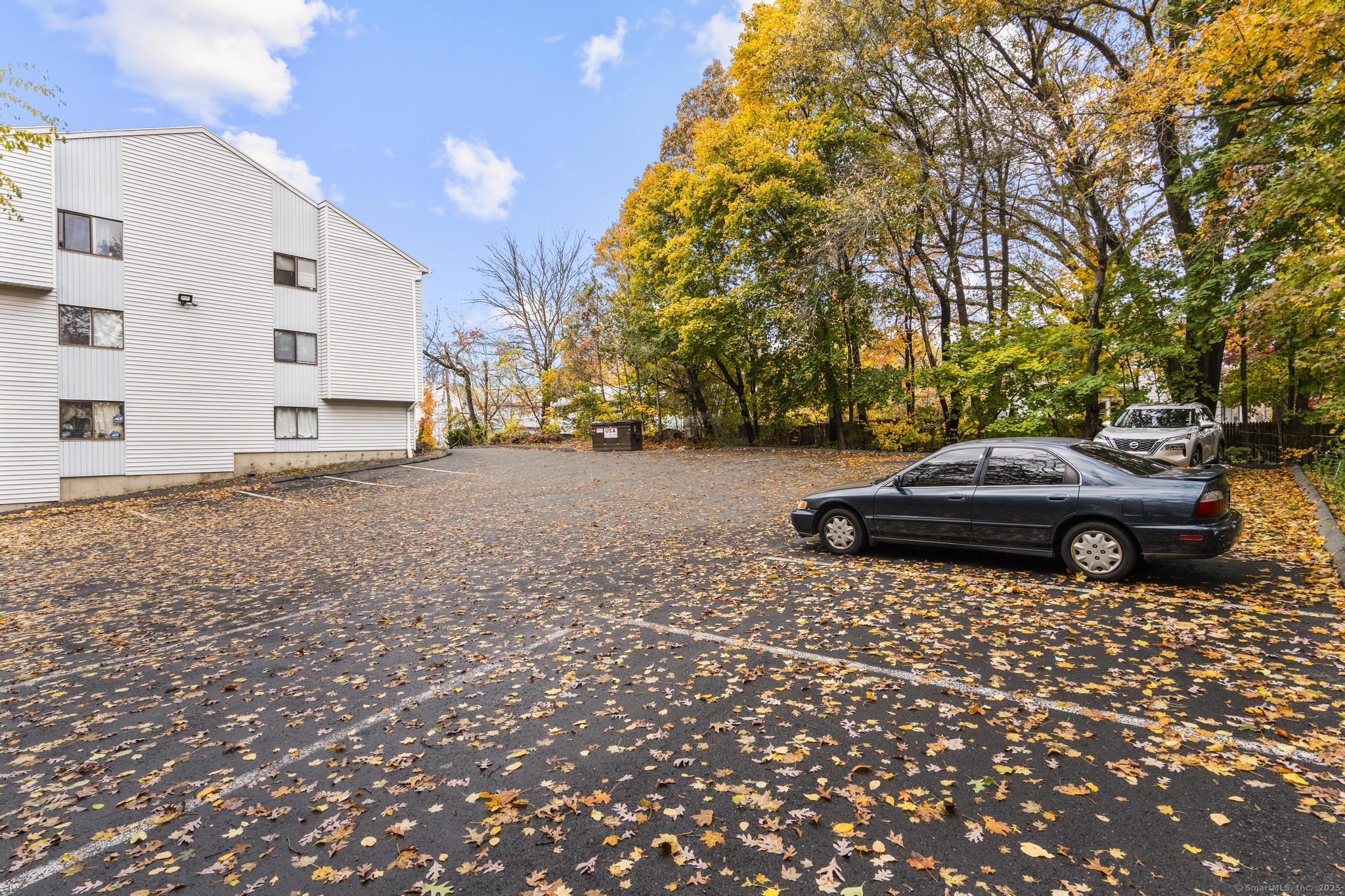 23 Shirley Street, Unit 3 Waterbury, CT 06708 - Photo 18 of 35 a couple of cars parked in front of a house