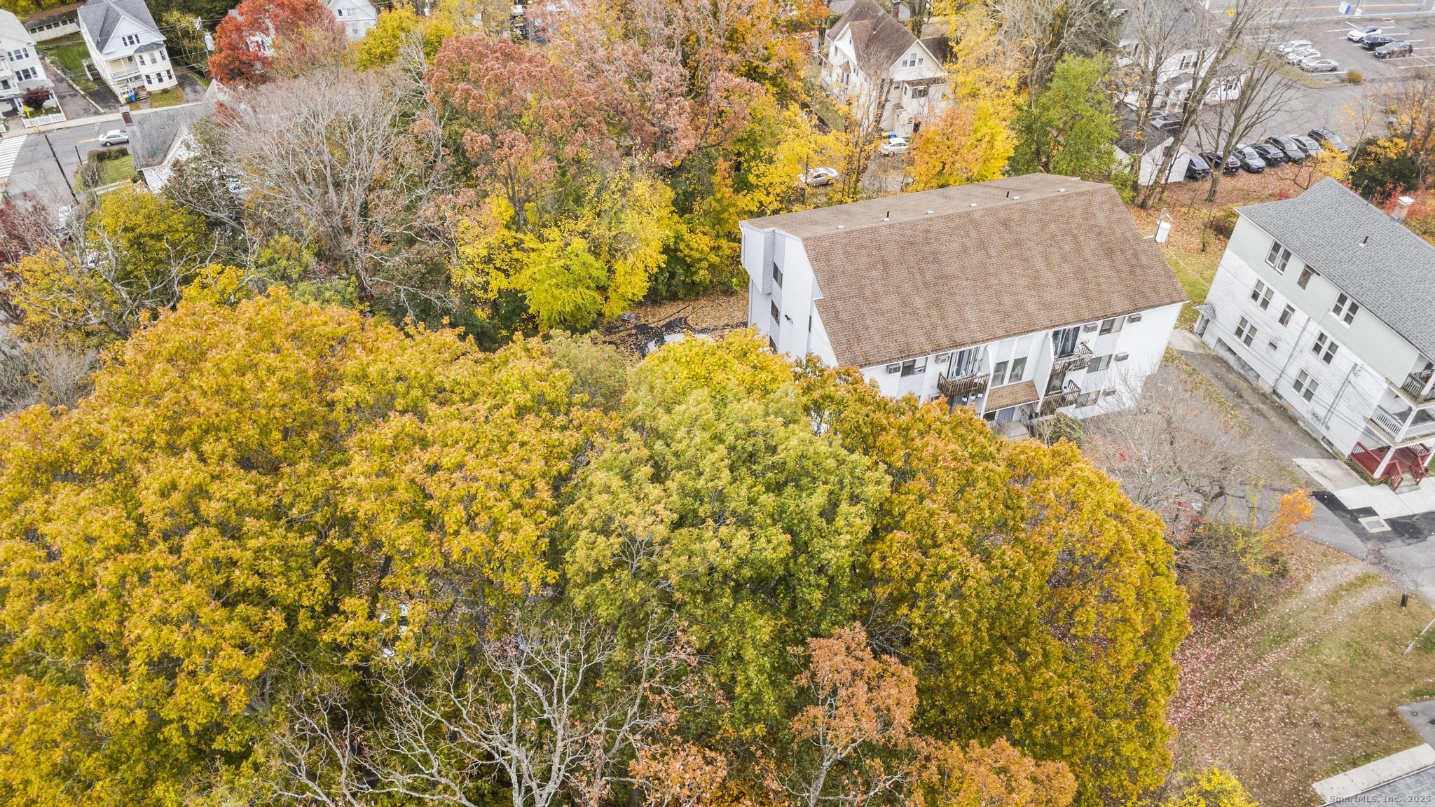 23 Shirley Street, Unit 3 Waterbury, CT 06708 - Photo 21 of 35 a bathroom with a sink and mirror