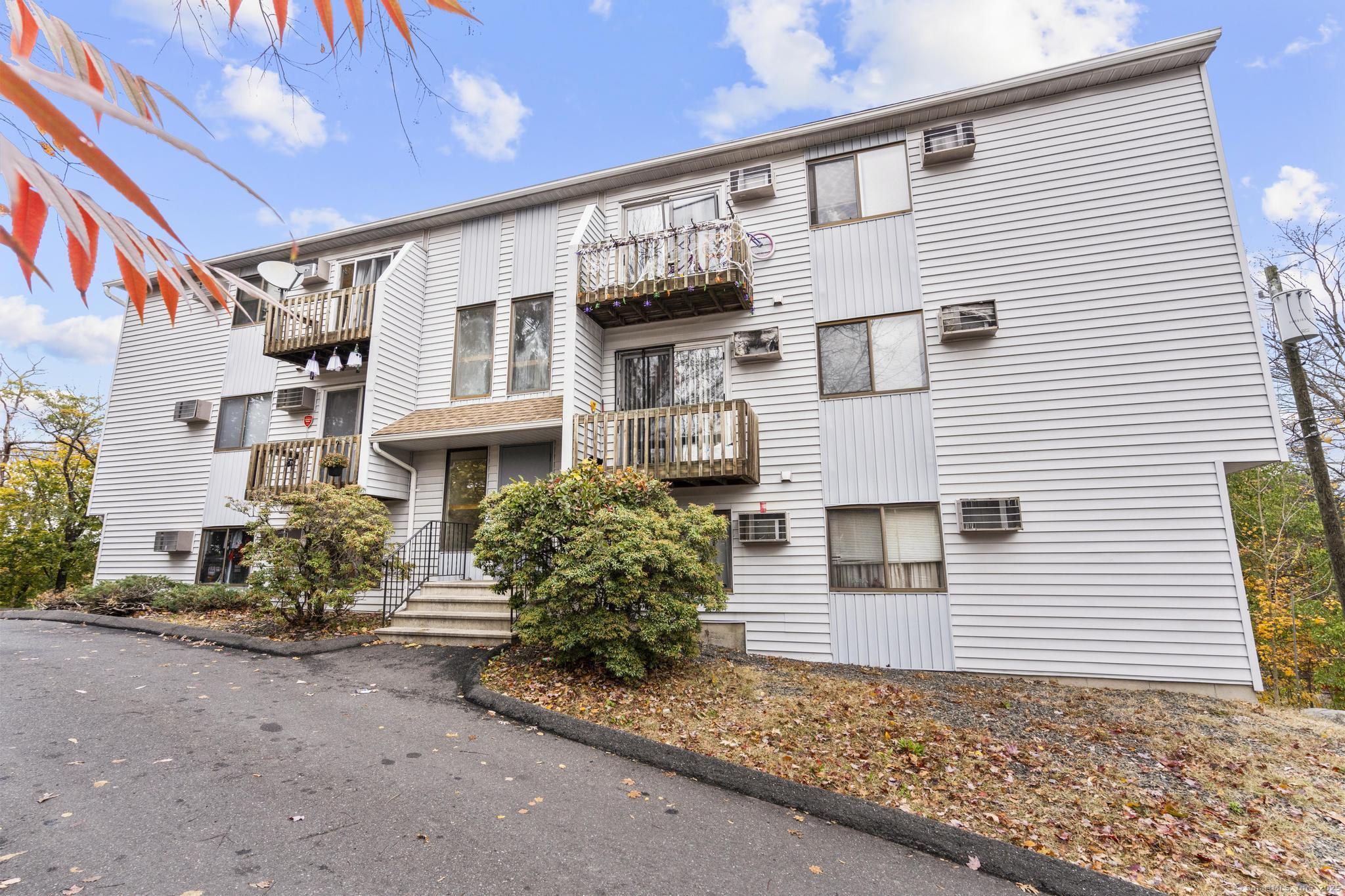 23 Shirley Street, Unit 3 Waterbury, CT 06708 - Photo 35 of 35 a front view of a house with garden